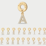 Charm luminoso de aros múltiples chapado en oro