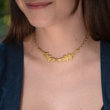Collar de coco bañado en oro